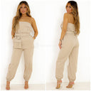 Koop afgeprijsde jumpsuit met strikceintuur. Ontdek prachtige dameskleding in Rotterdam.
