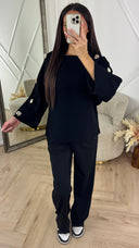 Luxe Knit Top met Gouden Knopen op de Mouwen